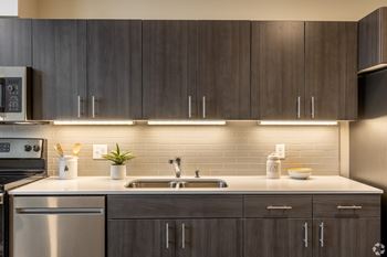 192Nd west lofts kitchen with subway tile backsplash